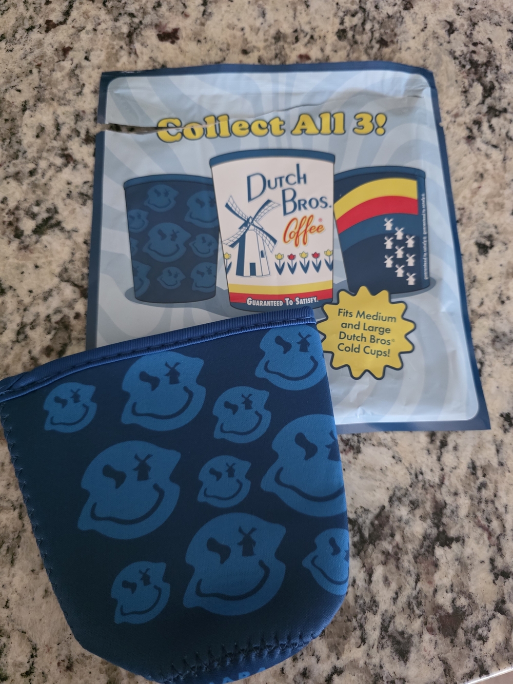 Dutch Bros Dark Blue Smiley Coffee Sleeve